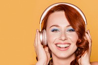 Woman listening to music through her headphones