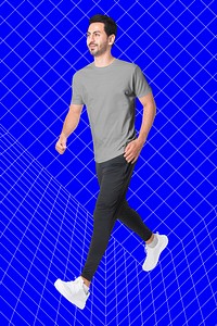 Sporty man walking in t-shirt and sweatpants, full body