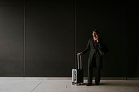 Businesswoman having phone call, business trip