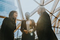 Happy diverse business women taking together