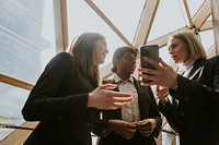 Diverse businesswomen chatting during break