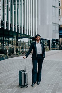 African business woman with travel luggage