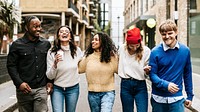 Diverse friends hanging out in city