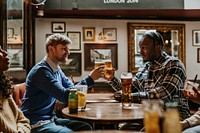 Friends toasting with beer, celebration photo