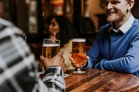 Friends toasting with beer, celebration photo