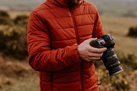 Photographer going through photos on camera