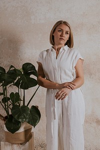 Woman wearing white linen dress, minimal fashion