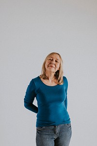 Mature woman in blue t-shirt and jeans