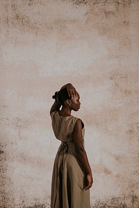 Woman in brown linen dress, minimal fashion