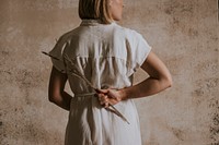 Woman in white linen dress, minimal fashion