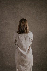 Mature woman wearing beige dress