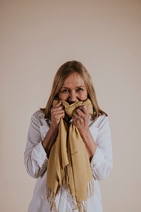 Happy woman wearing scarf, Winter fashion