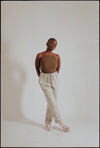 Woman wearing tank top, sweatpants, loungewear fashion