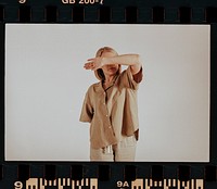 Woman wearing beige shirt, pants, minimal loungewear