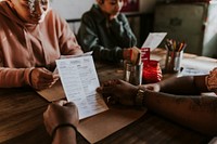 Family checking out menu at a restaurant