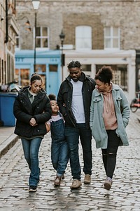 African-American family walking in city