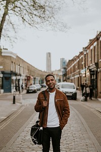 African-American man walking in city