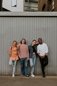 Cheerful diverse friends hanging out in the city