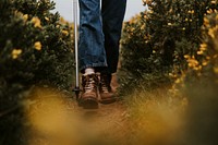 Closeup of leather boots on ground