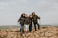 Happy family hiking on mountain, outdoor activity