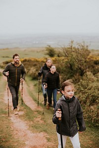 Family hiking on hill, outdoor activity