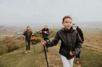 Happy family hiking on mountain, outdoor activity