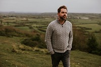 Man wearing knitted sweater, men's apparel