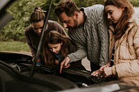 Family with broken car photo