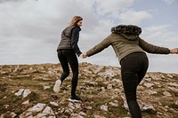 Happy women hiking together, outdoor activity