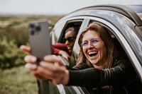 Women selfie on road trip photo