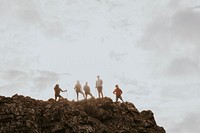 Hikers standing on mountain, outdoor activity