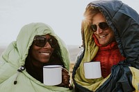 Camping couple having morning drinks