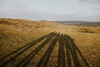 Hikers shadow on hill, outdoor activity photo