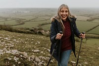 Senior woman hiking mountain, countryside, outdoor travel