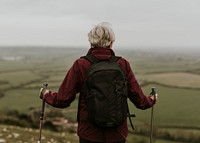 Senior woman hiking on mountain