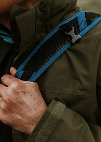 Camper carrying backpack closeup aesthetic