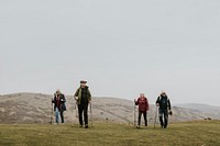 Senior hikers walking, nature travel photo