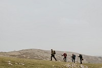 Senior hikers walking, nature travel photo