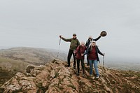 Happy senior hikers on mountain top