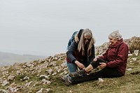 Woman wrapping elastic bandage, first aid