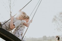 Siblings playing at the playground