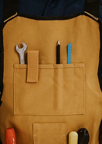 Handyman tools in welding apron