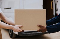 Delivery man handing box to customer