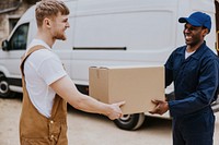 Delivery man handing box to customer