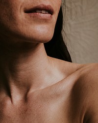 Woman, bare neck & shoulders closeup photo