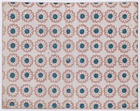 Sheet with overall pattern of pink flowers with blue centers