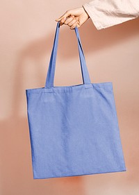 Blue canvas tote bag with design space