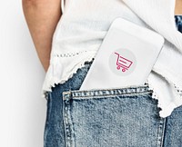 Network graphic overlay digital device in jeans pocket