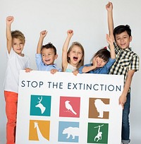 Young kids holding a save the animals banner