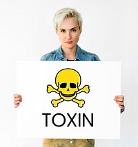 People holding placard with skull icon and chemicals dangerous